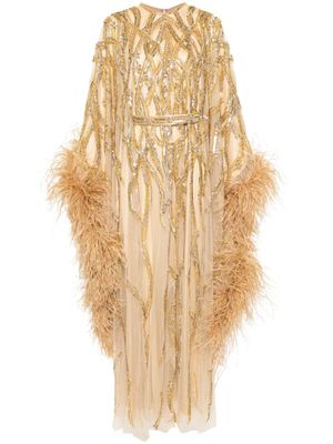 Dina Melwani robe longue bordée de plumes