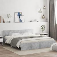 Bedframe met hoofdeinde en LED-licht betongrijs 200x200 cm