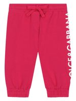 Dolce & Gabbana Kids pantalon de jogging à logo imprimé - Rouge - thumbnail