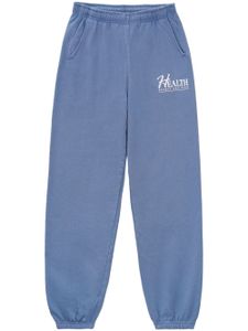 Sporty & Rich pantalon de jogging en coton à slogan imprimé - Bleu