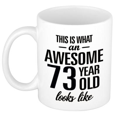 This is what an awesome 73 year old looks like - cadeau koffiemok - 300 ml - verjaardag 73 jaar This is what an awesome 73 year old looks like - cadeau koffiemok - 300 ml - verjaardag 73 jaar