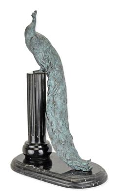 A BRONZE SCULPTURE OF A PEACOCK