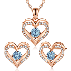 Set van Rose Gouden Hartvormige Ketting en Oorbellen met Zirkoon en Blauw Kristal - Sieraden - Spiritueelboek.nl