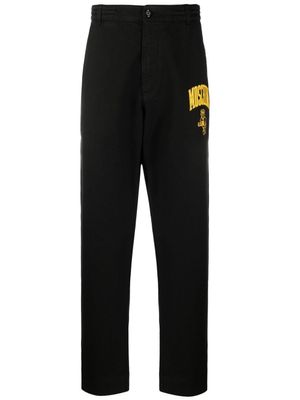 Moschino pantalon droit à logo imprimé - Noir