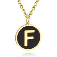 Goudkleurige Dames Schakelketting met Zwarte Kettinghanger Letter F