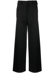 MM6 Maison Margiela pantalon évasé à bande logo - Noir