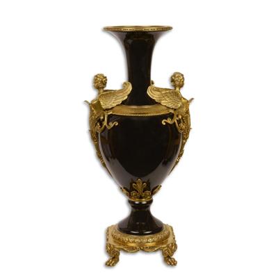 A BRONZE MOUNTED PORCELAIN BALUSTER VASE