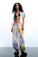 Lange broek met bloemenprint - MATERIAL FINISHES - XL