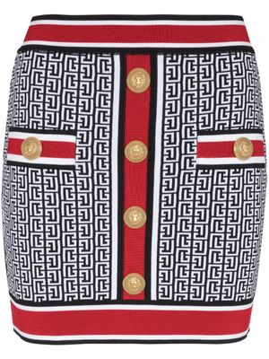 Balmain minijupe en maille à motif monogrammé - Bleu