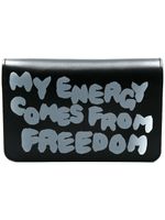 Comme Des Garçons Wallet portefeuille à slogan imprimé - Noir