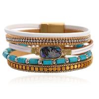 Deja Boho Armband goudkleurig met turquoise kralen en ovale natuursteen in wit