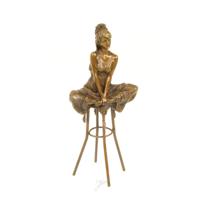 A BRONZE SCULPTURE OF A LADY ON BARCHAIR