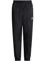 Ea7 Emporio Armani pantalon de jogging à logo imprimé - Noir