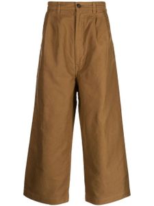 Comme des Garçons Homme pantalon ample en coton à coupe courte - Marron