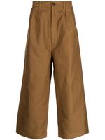 Comme des Garçons Homme pantalon ample en coton à coupe courte - Marron