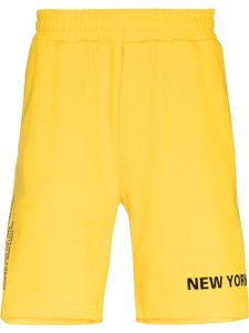 Helmut Lang short à slogan imprimé - Jaune