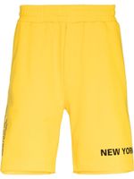 Helmut Lang short à slogan imprimé - Jaune