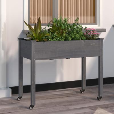 Plantenbak op wieltjes 118x59x80 cm massief vurenhout grijs