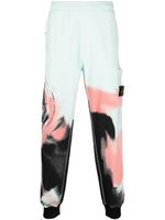 Stone Island pantalon de jogging Motion Saturation à imprimé abstrait - Vert