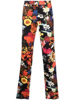 Moschino pantalon fuselé à fleurs - Noir