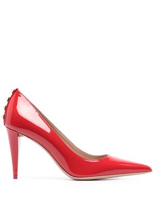 Valentino Garavani escarpins en cuir verni à ornements Rockstud - Rouge