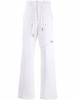 Nike X Off-White pantalon bootcut à logo - Tons neutres