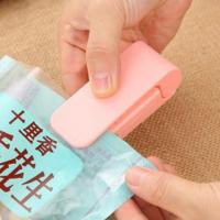 Portable Mini Plastic Bag Sealing Machine Laminating Machine Household Hand Pressure Heat Sealing Machine(Pink)