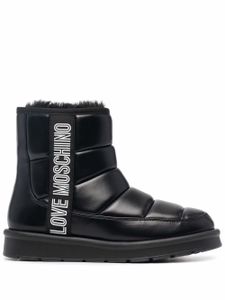 Love Moschino bottes à logo imprimé - Noir