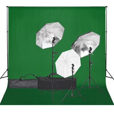 Fotostudioset met verlichtingsset en achtergrond