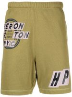 Heron Preston short de sport à logo imprimé - Vert