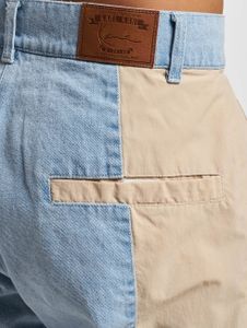 Karl Kani / Cargobroek Signature Patchwork in blauw