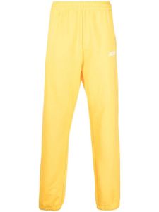 Jacquemus pantalon de jogging en coton biologique à logo imprimé - Jaune