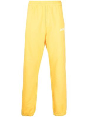 Jacquemus pantalon de jogging en coton biologique à logo imprimé - Jaune