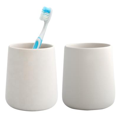 Badkamer beker / tandenborstelhouder Earth Serie - 2x - Keramiek - ivoor wit - 8 x 10 cm Badkamer beker / tandenborstelhouder Earth Serie - 2x - Keramiek - ivoor wit - 8 x 10 cm