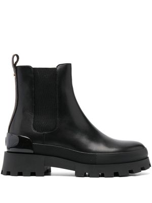 Michael Michael Kors bottines en cuir à logo embossé - Noir