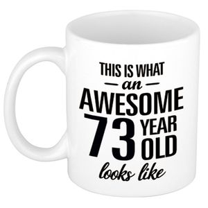 Awesome 73 year cadeau mok / beker 300 ml   -