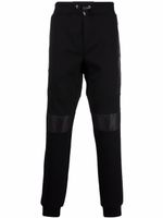 Philipp Plein pantalon de jogging en coton à lien de resserrage - Noir