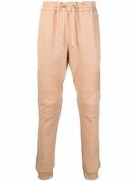 Balmain pantalon de jogging à logo imprimé - Tons neutres Balmain pantalon de jogging à logo imprimé - Tons neutres