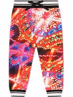 Dolce & Gabbana Kids pantalon Luminarie fuselé à imprimé graphique - Rouge