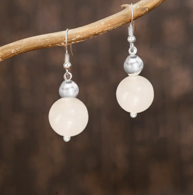 Bergkristal bol oorbellen - Sieraden - Spiritueelboek.nl