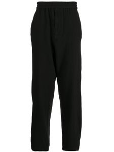 Undercover pantalon de jogging en maille - Noir