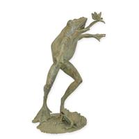 A BRONZE FOUNTAIN FROG WITH DRAGONFLY