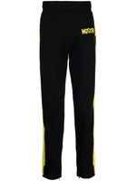 Moschino pantalon de jogging à logo imprimé - Noir