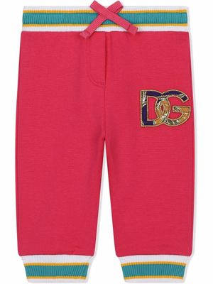 Dolce & Gabbana Kids pantalon de jogging à patch logo - Rose Dolce & Gabbana Kids pantalon de jogging à patch logo - Rose