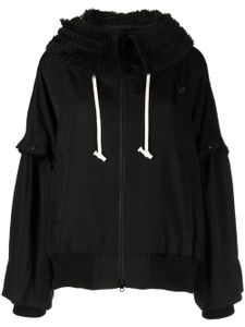 Yohji Yamamoto hoodie bordé de fourrure artificielle - Noir