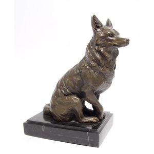 A BRONZE SCULPTURE OF A FOX