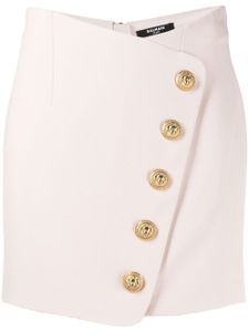 Balmain minijupe portefeuille à design asymétrique - Rose