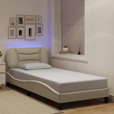 Bedframe met LED zonder matras 90x200 cm stof crèmekleurig