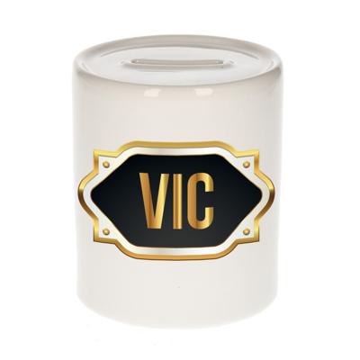 Spaarpot met voornaam Vic - wit - goud/zwart embleem - 8 x 9 cm - keramiek - afsluitdop Spaarpot met voornaam Vic - wit - goud/zwart embleem - 8 x 9 cm - keramiek - afsluitdop