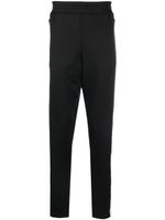 Moschino pantalon de jogging à logo imprimé - Noir
